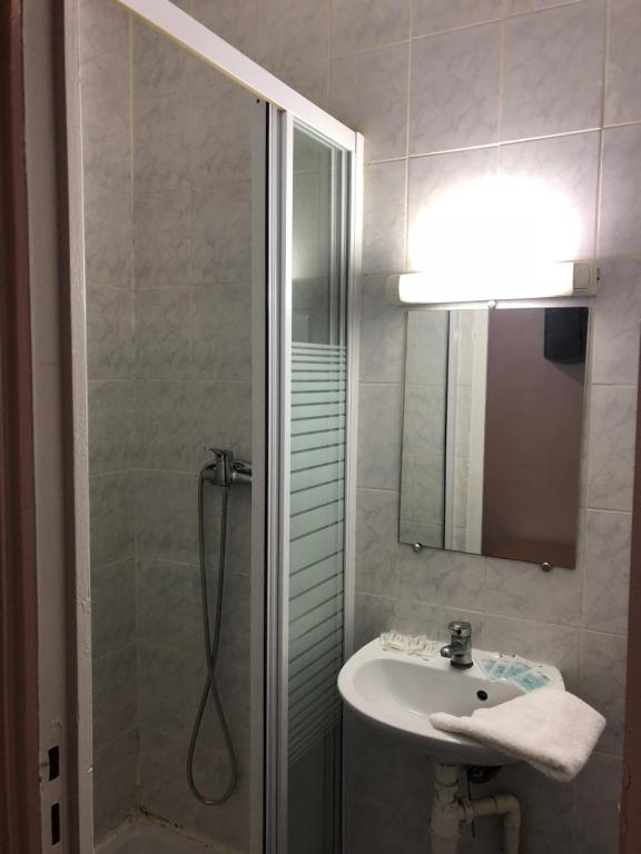 Koupelna v ubytování Hotel Chevallier