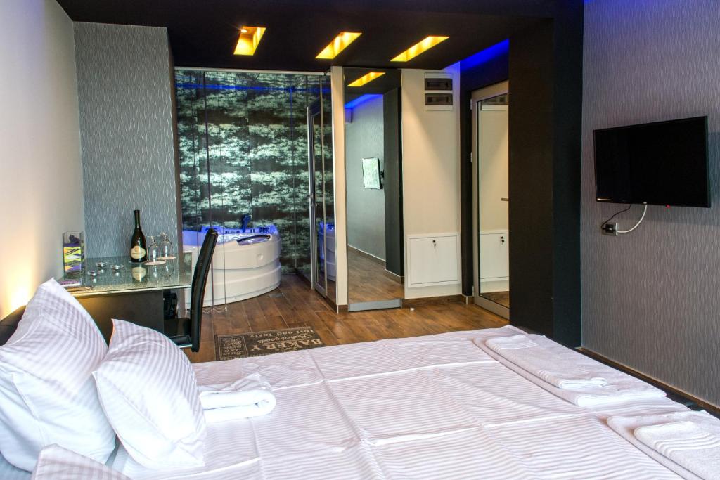 Postel nebo postele na pokoji v ubytování Zam Residence