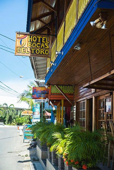 a hotel sign on the side of a building at Hotel Bocas del Toro in Bocas del Toro