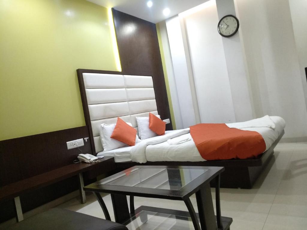 Postel nebo postele na pokoji v ubytování Hotel One Up