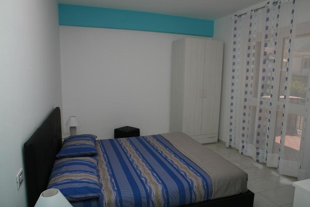 Posteľ alebo postele v izbe v ubytovaní B&B Torre Nave