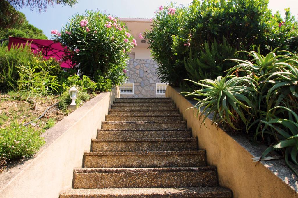 a set of stairs in front of a house at Villa Ghiatone in Pietrosella