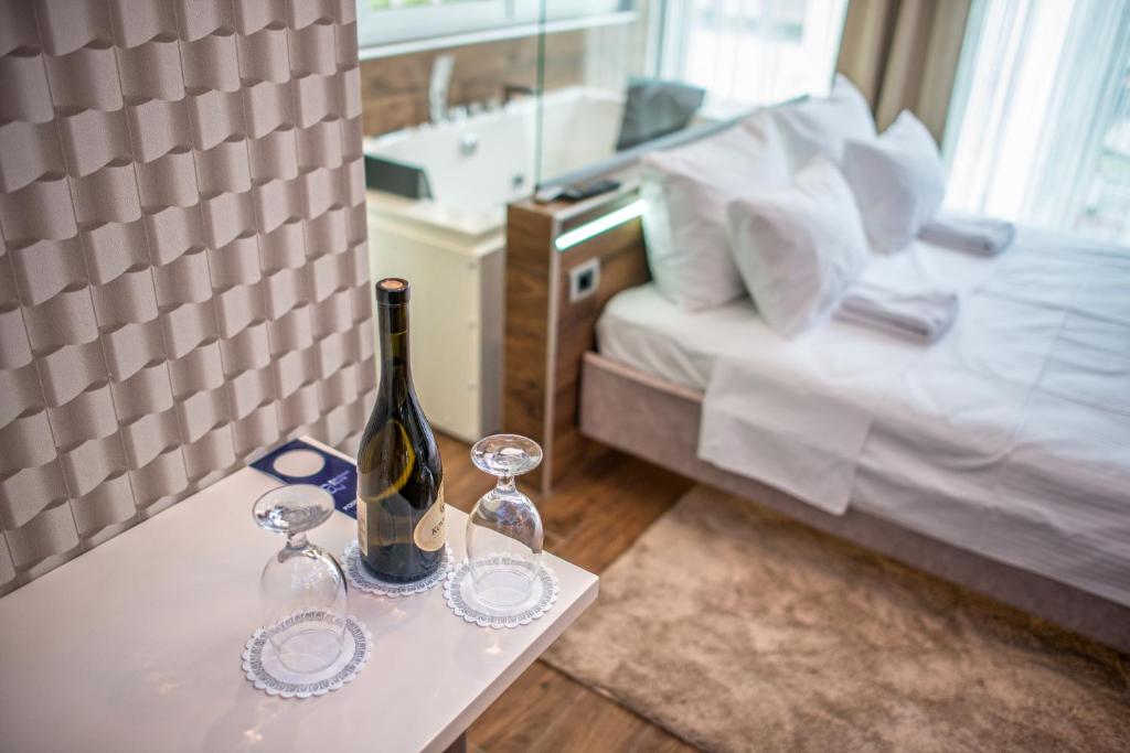 Postel nebo postele na pokoji v ubytování Zam Residence