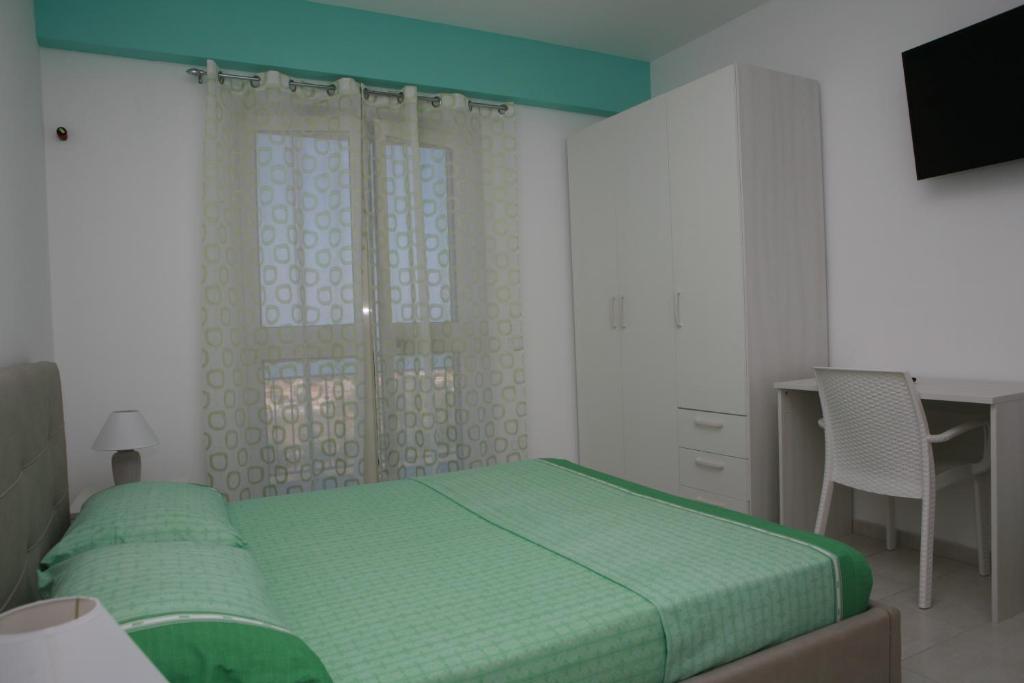 Posteľ alebo postele v izbe v ubytovaní B&B Torre Nave