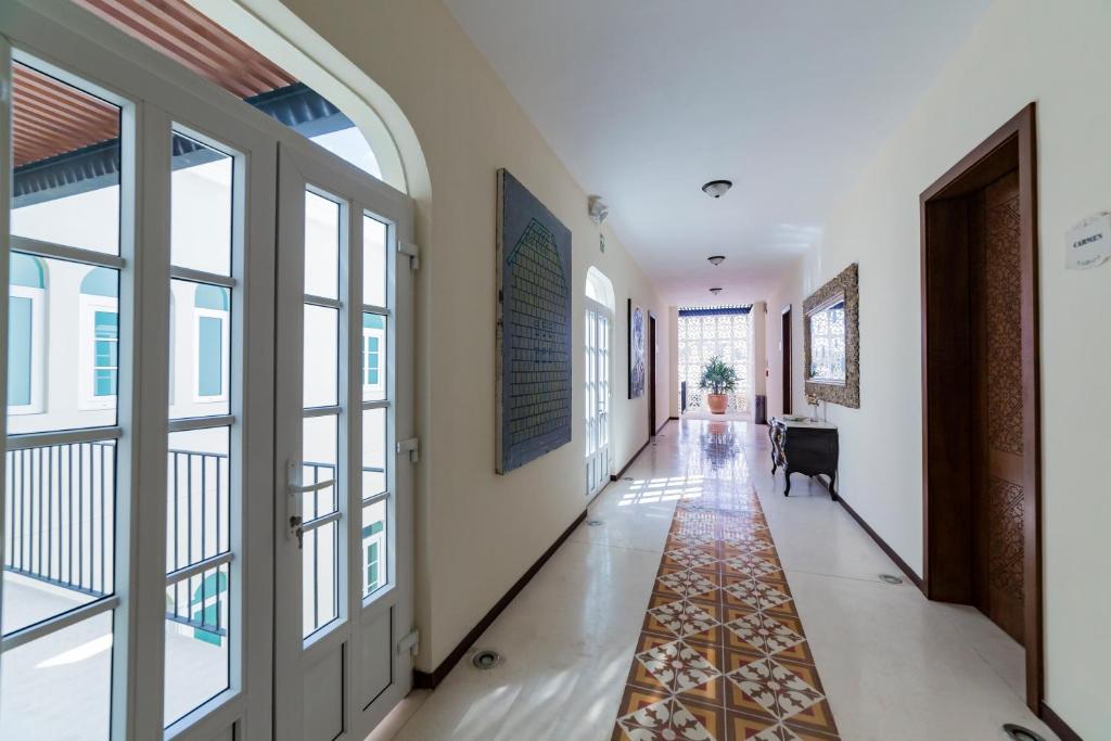 TV a/nebo společenská místnost v ubytování Delfina Boutique Hotel