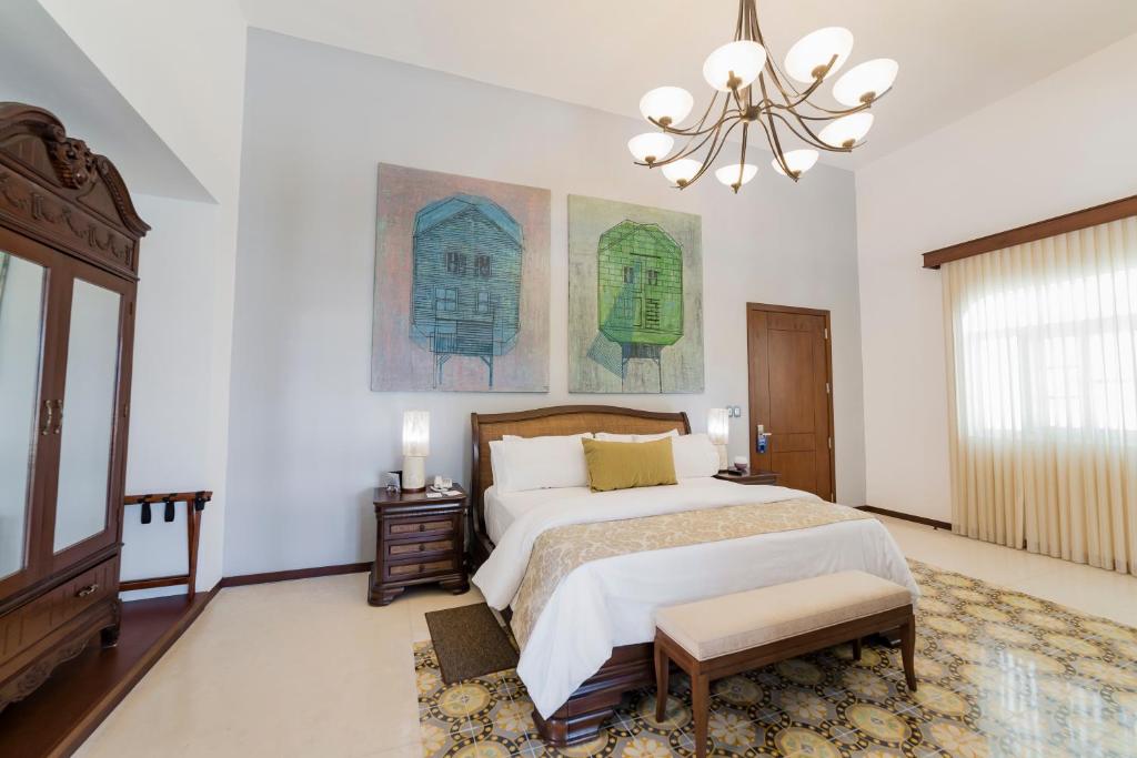 Postel nebo postele na pokoji v ubytování Delfina Boutique Hotel