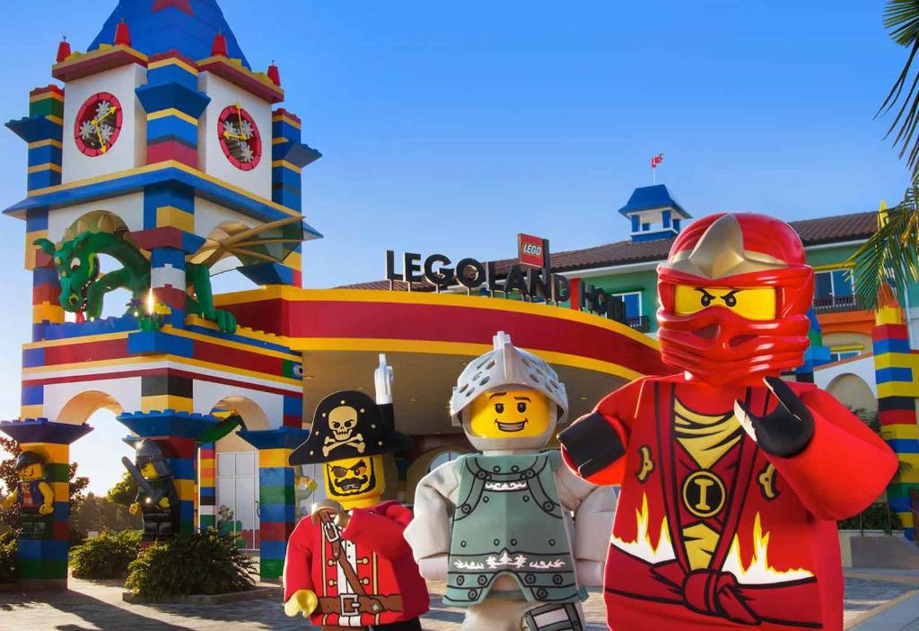 a group of lego figurines in front of a building at LEGOLAND California Hotel and Castle Hotel in Carlsbad
