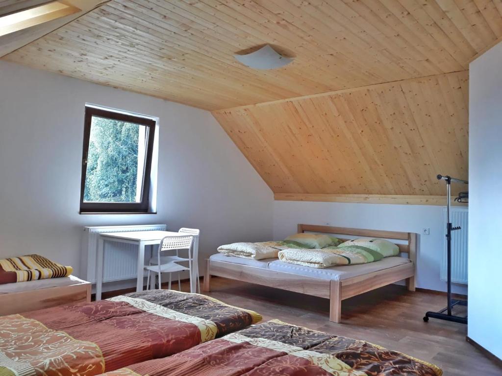 Postel nebo postele na pokoji v ubytování Chata OSTRUZINA 9