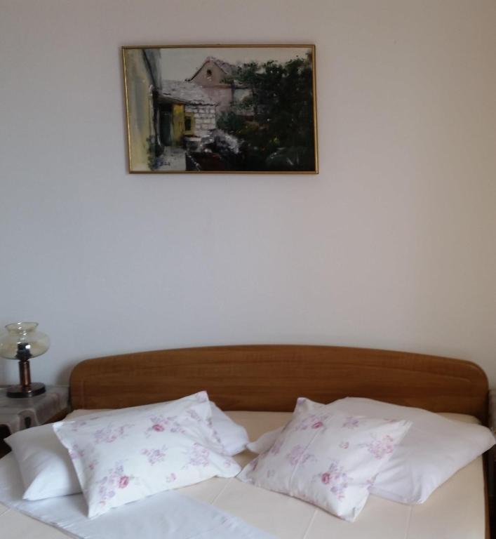Posteľ alebo postele v izbe v ubytovaní Rooms Raos