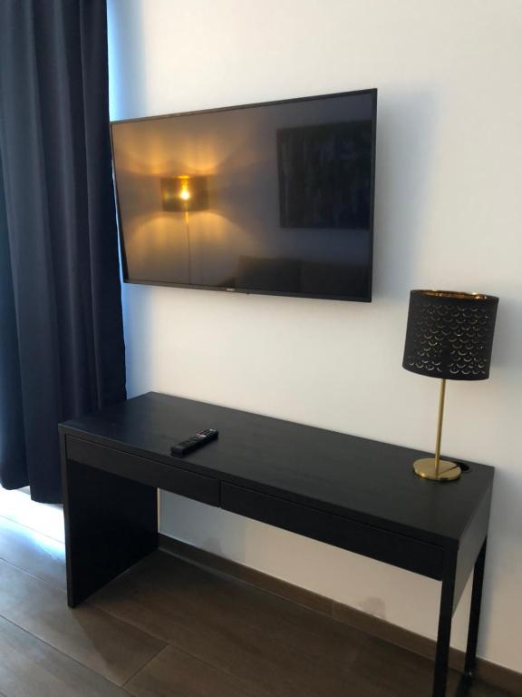 TV a/nebo společenská místnost v ubytování Hotel Jadran