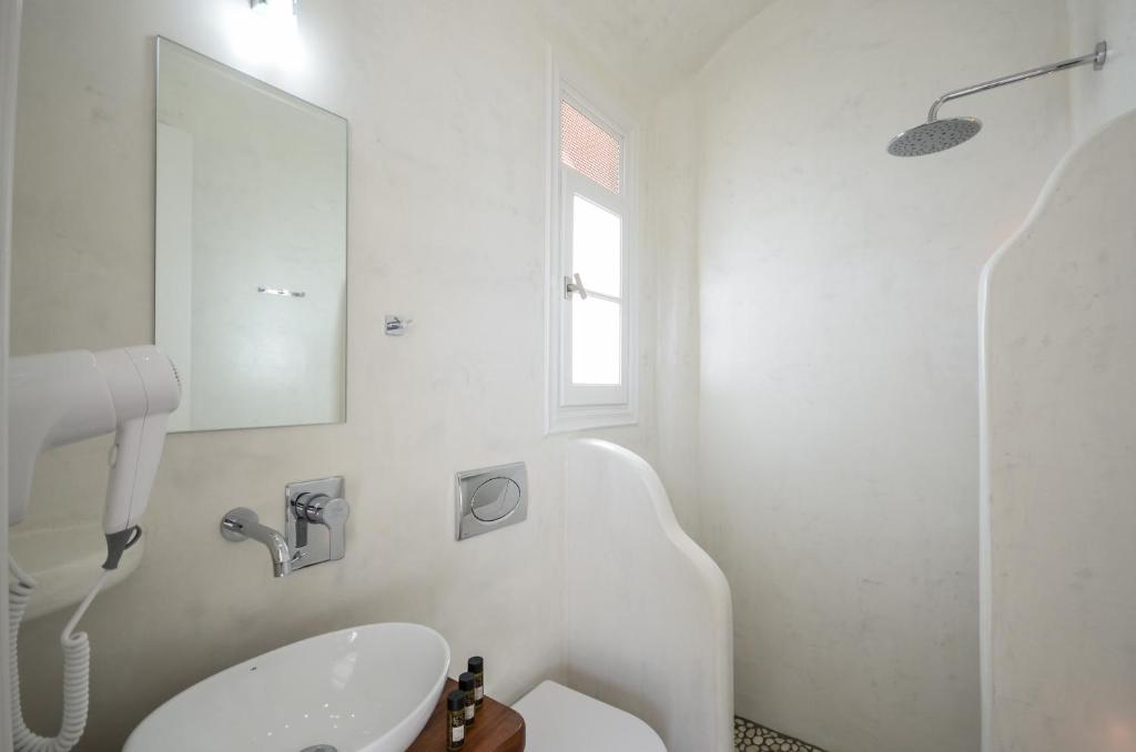 Kúpeľňa v ubytovaní Ostria Hotel