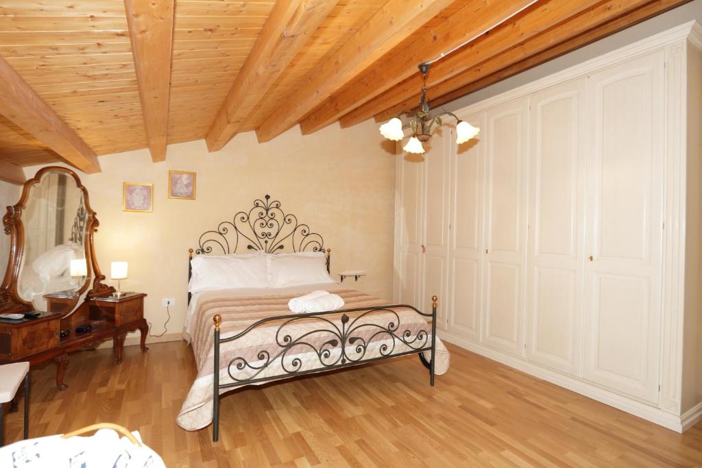 Posteľ alebo postele v izbe v ubytovaní "Suliscenti" Dimora Siciliana B&B