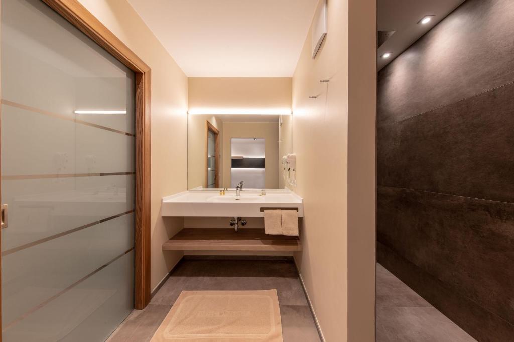 Postel nebo postele na pokoji v ubytování Hotel Winzerhof