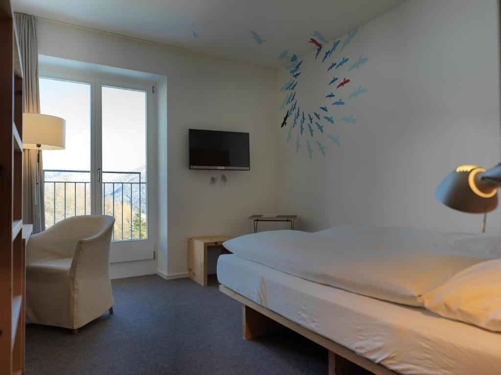 Postel nebo postele na pokoji v ubytování Hotel Castell