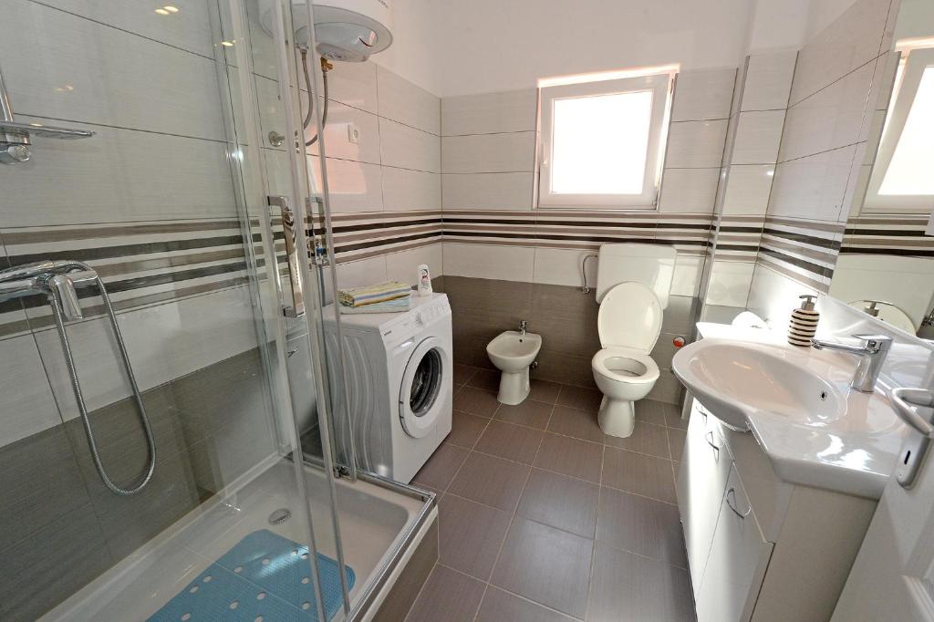 Kúpeľňa v ubytovaní Apartman Adriana