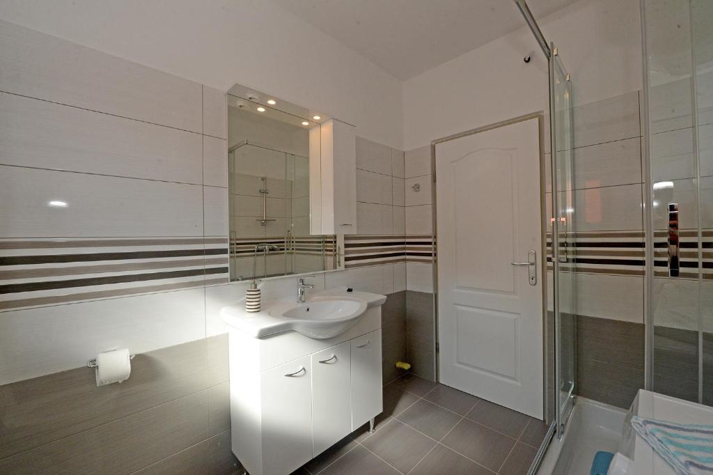 Kúpeľňa v ubytovaní Apartman Adriana