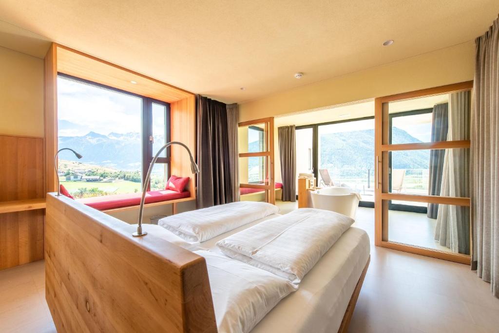 Postel nebo postele na pokoji v ubytování Bio Hotel Panorama