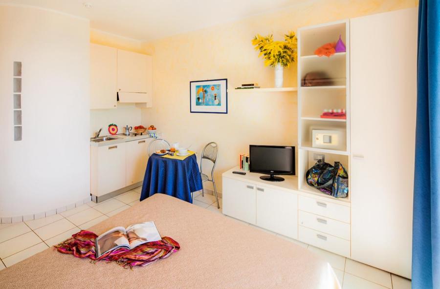 TV a/nebo společenská místnost v ubytování Residence Modus Vivendi