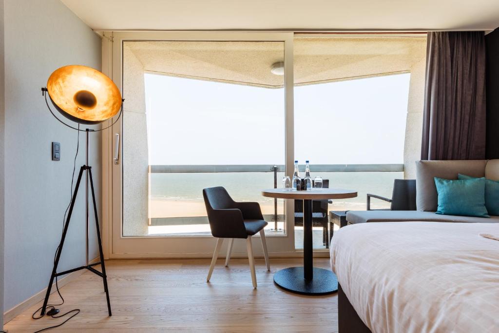 Postel nebo postele na pokoji v ubytování C-Hotels Andromeda