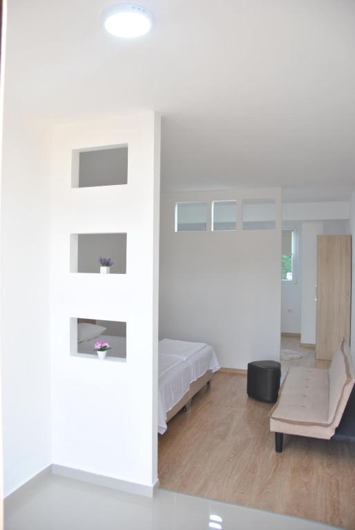 Krevet ili kreveti u jedinici u okviru objekta Haamel Apartment