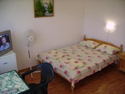 Postel nebo postele na pokoji v ubytování Guest House "Tania"