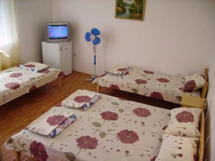 Postel nebo postele na pokoji v ubytování Guest House "Tania"