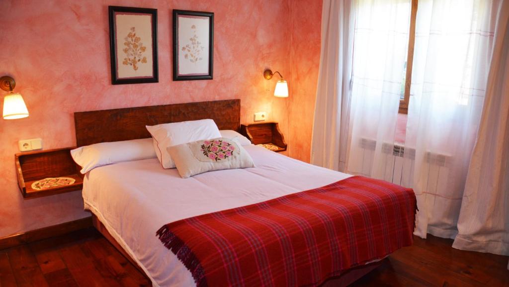 Postel nebo postele na pokoji v ubytování Casa del Altozano