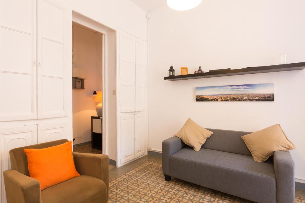 Posezení v ubytování ApartEasy - Central Gracia Apartments