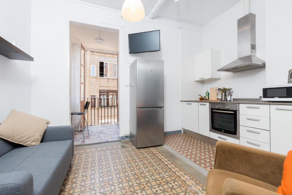 Kuchyň nebo kuchyňský kout v ubytování ApartEasy - Central Gracia Apartments
