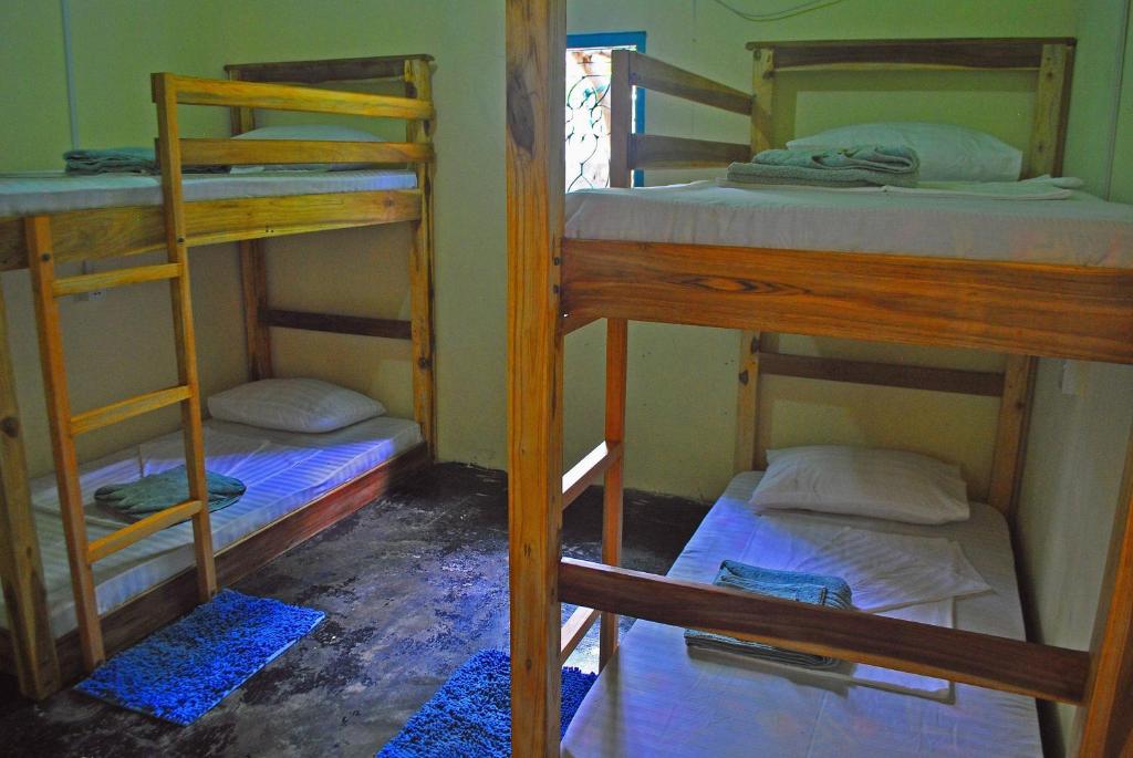 Postel nebo postele na pokoji v ubytování Coco Hostels - Arugambay