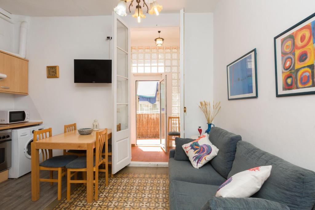 TV a/nebo společenská místnost v ubytování ApartEasy - Central Gracia Apartments