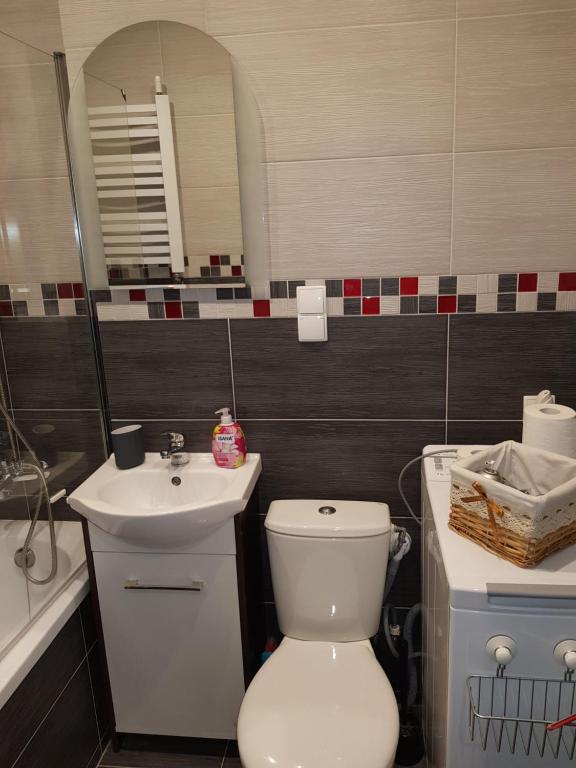 Kúpeľňa v ubytovaní Apartament Kinio