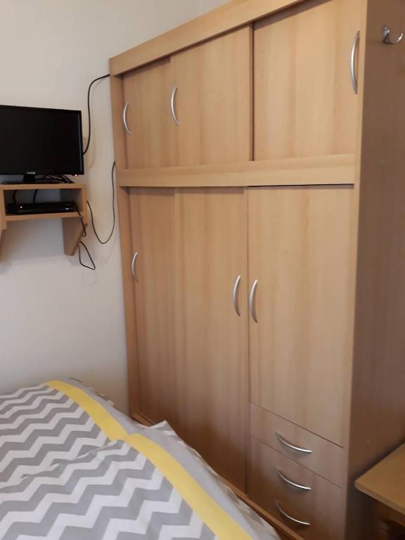TV a/nebo společenská místnost v ubytování Ádám Vendégház