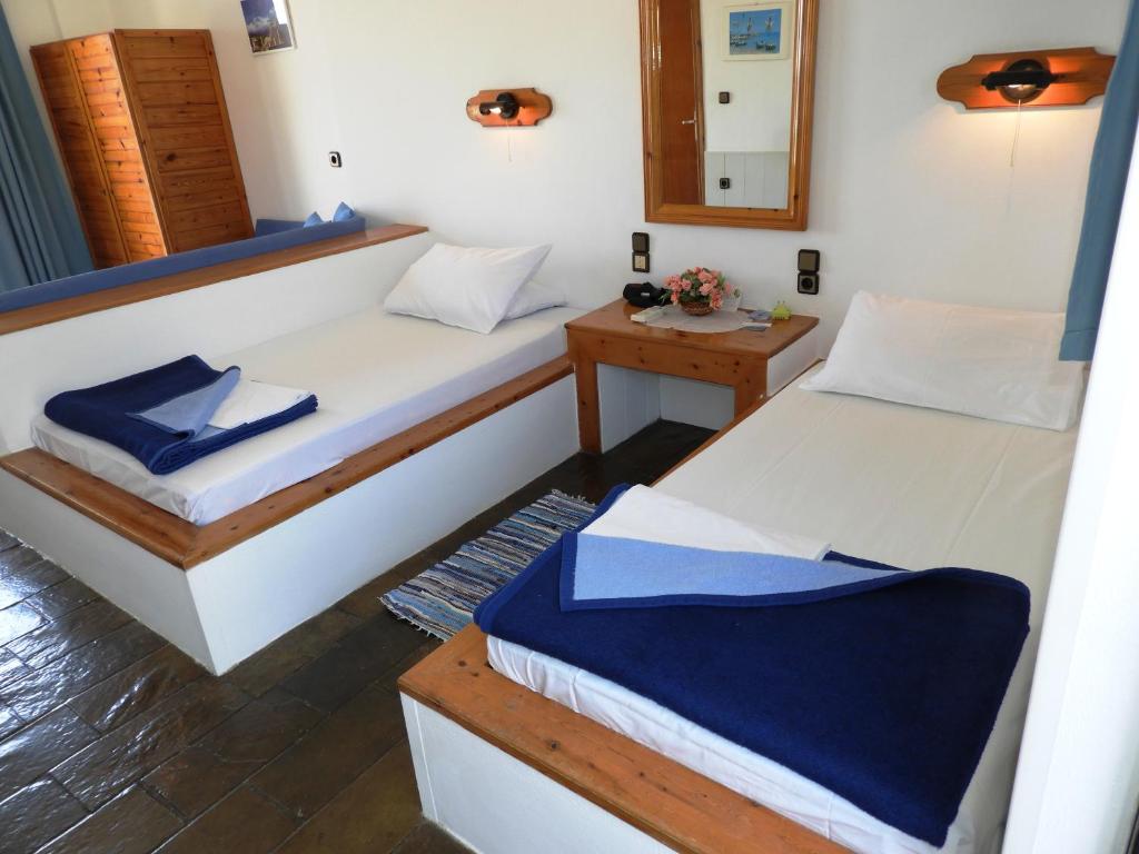 Łóżko lub łóżka w pokoju w obiekcie Diana Apartments