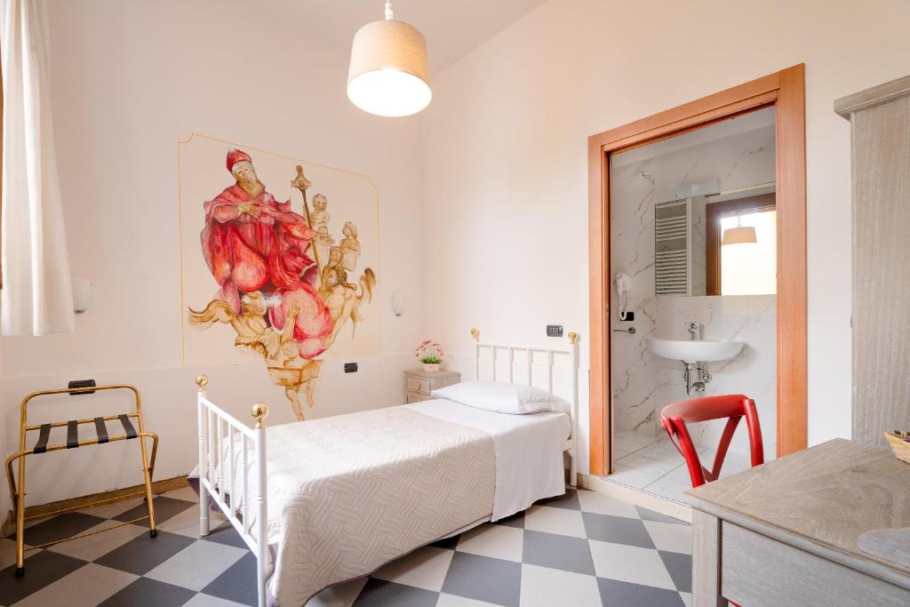 Postel nebo postele na pokoji v ubytování Hostel Archi Rossi