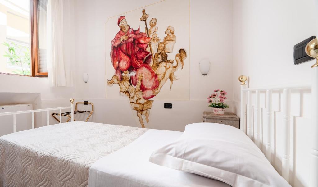 Postel nebo postele na pokoji v ubytování Hostel Archi Rossi