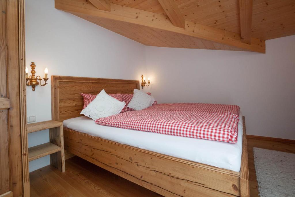 Postel nebo postele na pokoji v ubytování Hotel Garni Zimmermann
