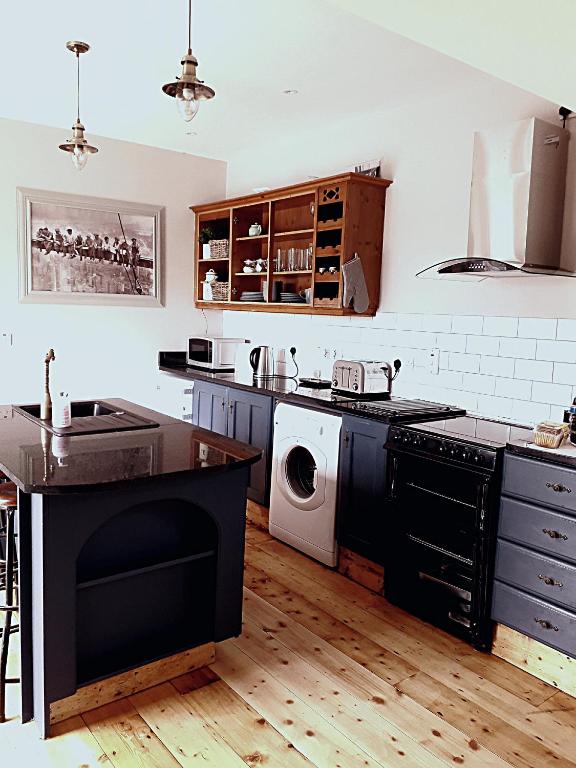 Kuchyň nebo kuchyňský kout v ubytování Ash Cottage