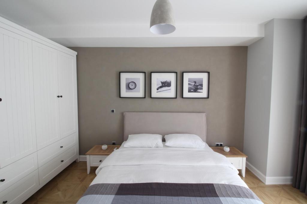 Postel nebo postele na pokoji v ubytování Elia Apartments
