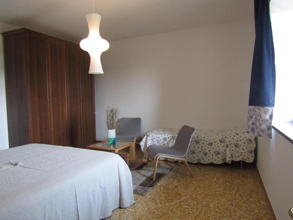 Łóżko lub łóżka w pokoju w obiekcie Villa Lavanda