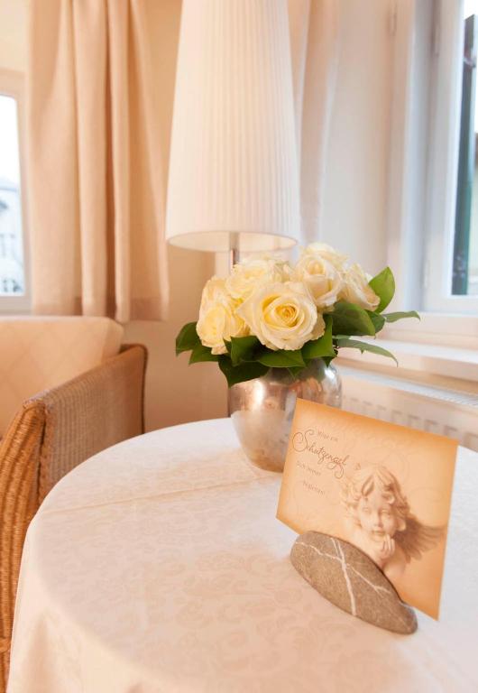 Postel nebo postele na pokoji v ubytování Hotel Fischerhaus