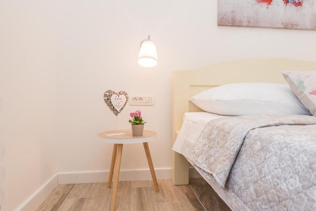 Postel nebo postele na pokoji v ubytování Sakarun House - Ivana