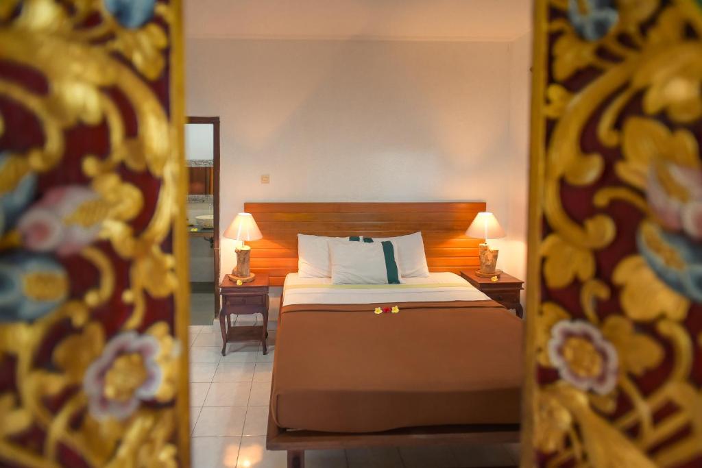 Postel nebo postele na pokoji v ubytování Ina Inn