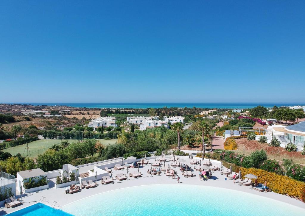 an aerial view of a resort with a swimming pool at VOI Marsa Siclà Essentia in Sampieri