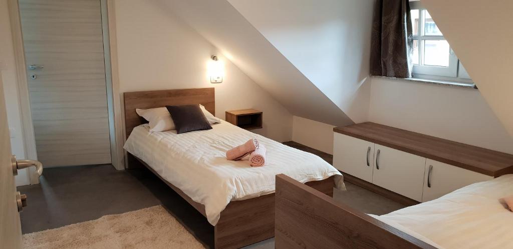 Postel nebo postele na pokoji v ubytování B&B Vidmar, Lesce-Bled