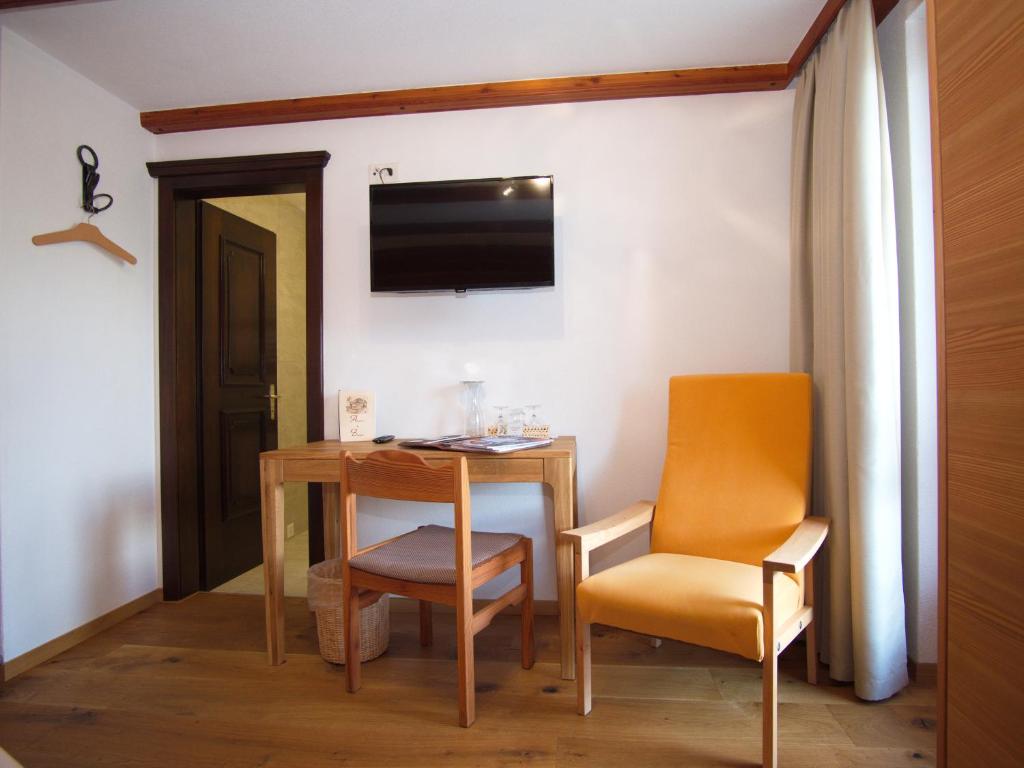 TV a/nebo společenská místnost v ubytování Hotel Alpenblick