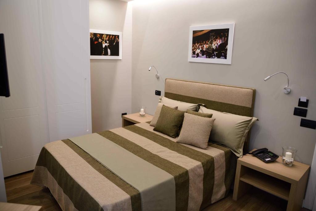 Postel nebo postele na pokoji v ubytování 50 SUITE Guesthouse