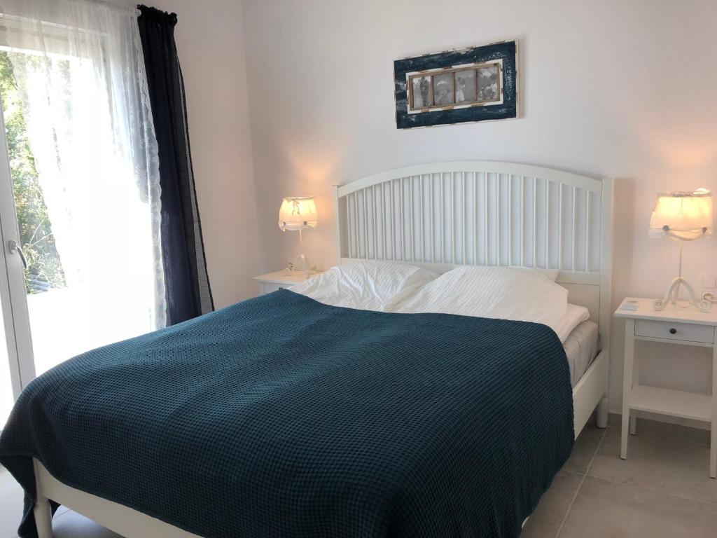 Кровать или кровати в номере Villa Salina Luxury Pool Villa