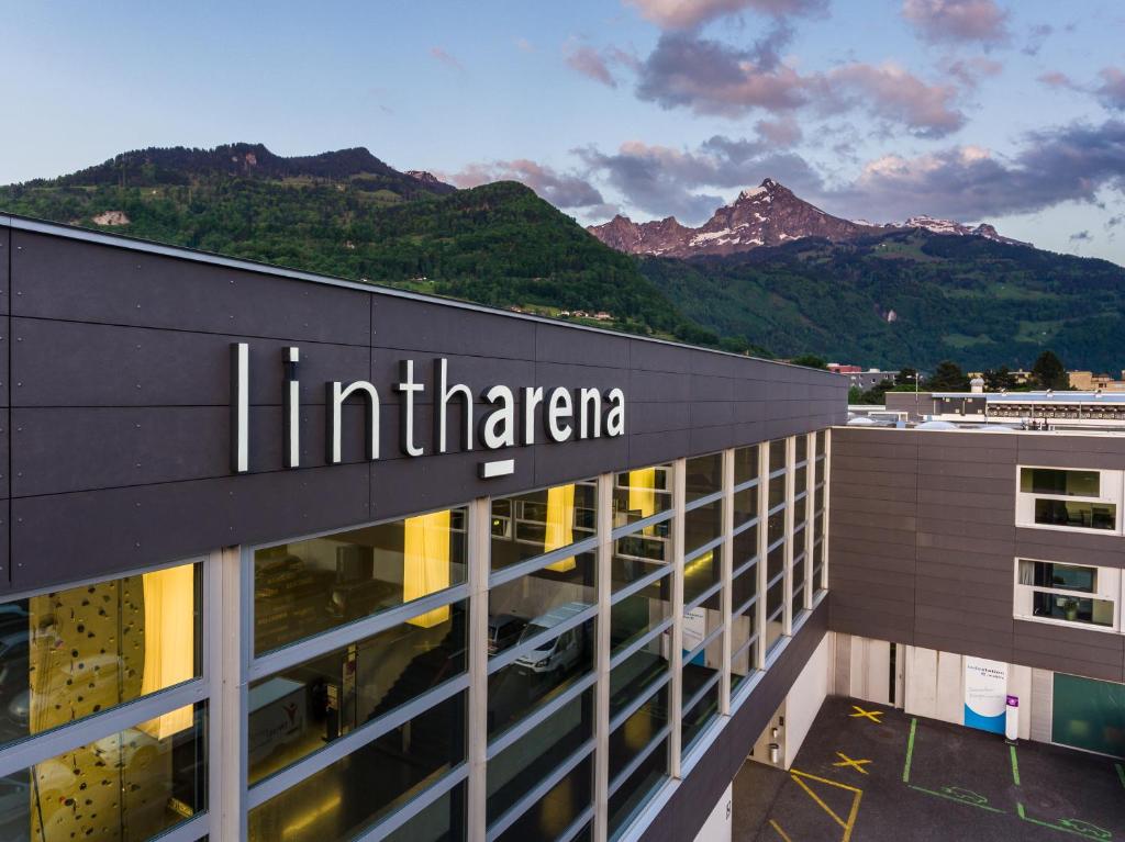 a building with the words iir america on it at lintharena ag in Näfels