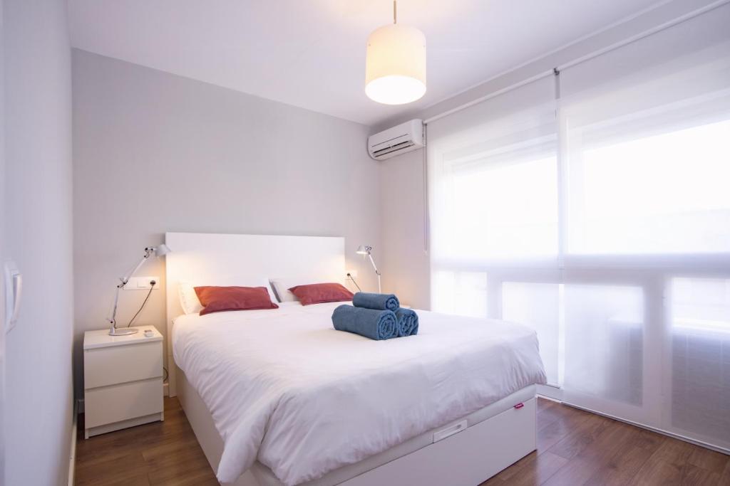 Postel nebo postele na pokoji v ubytování Malagueta Cool Beach Apartment